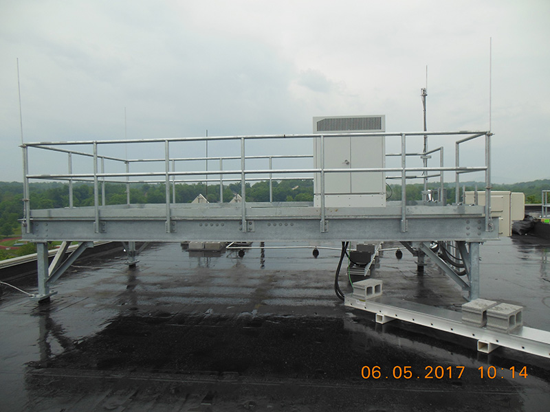 Cell antenna installation on top of the roof of Boyer Hall.