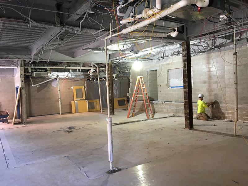 A worker working on the Larsen finance lab renovation project.