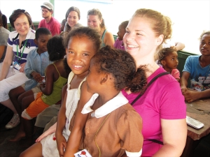 Mercy Ships volunteer Caitlyn Williams visits with children