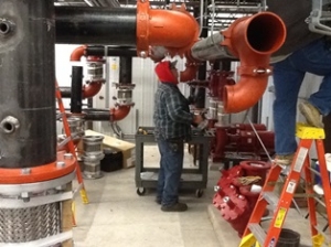 Piping being installed inside chiller room