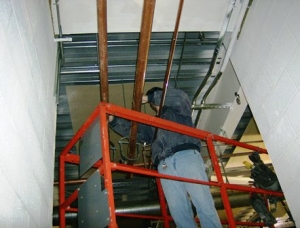 Frey Hall ground floor pipe installation