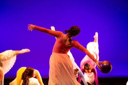 A student performing on stage.