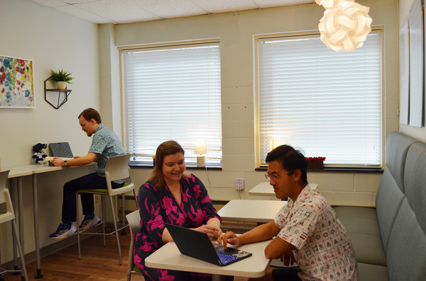 Career Coach meeting with two students