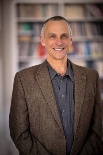 headshot of Symposium 27 speaker