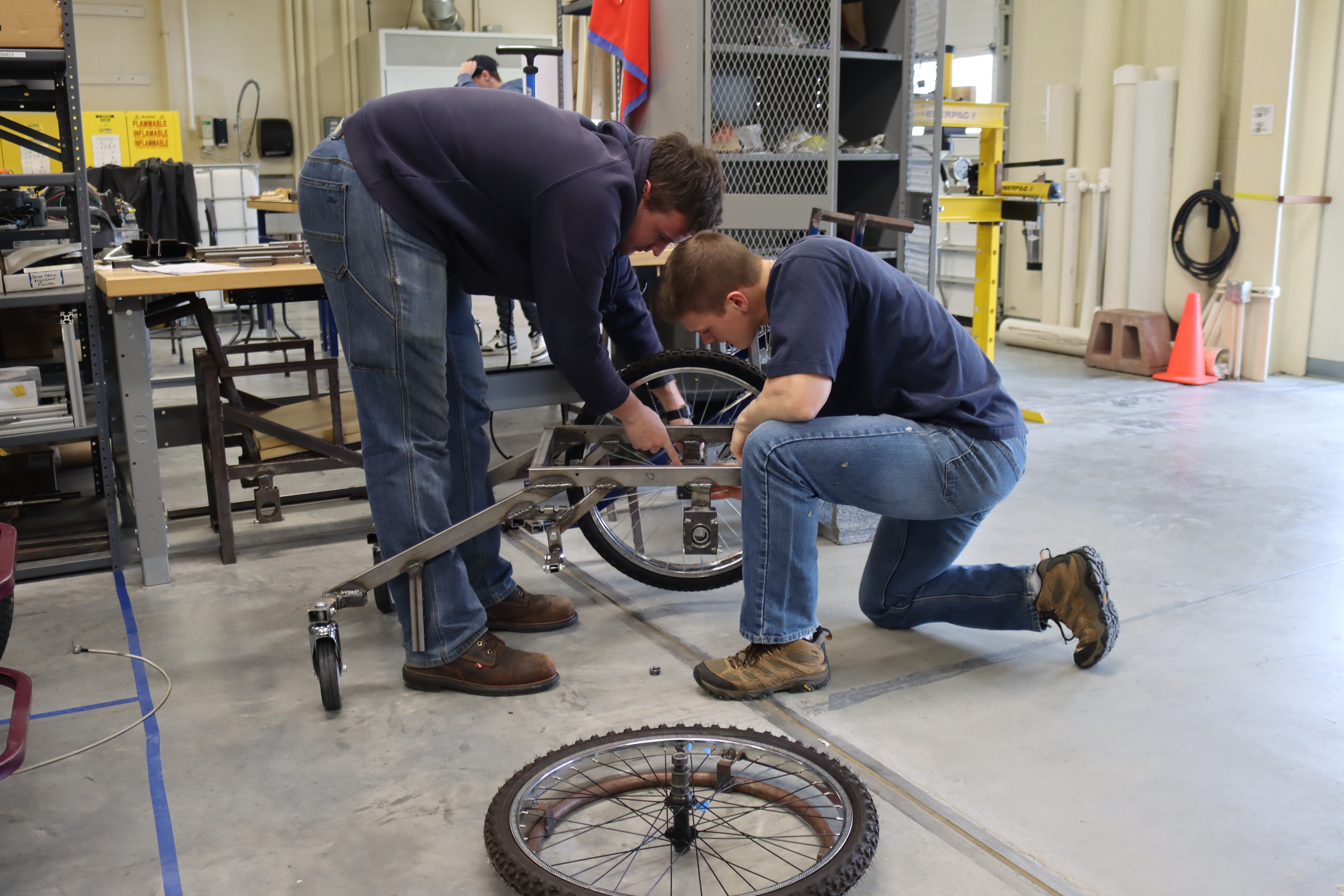 Students working on wheelchair