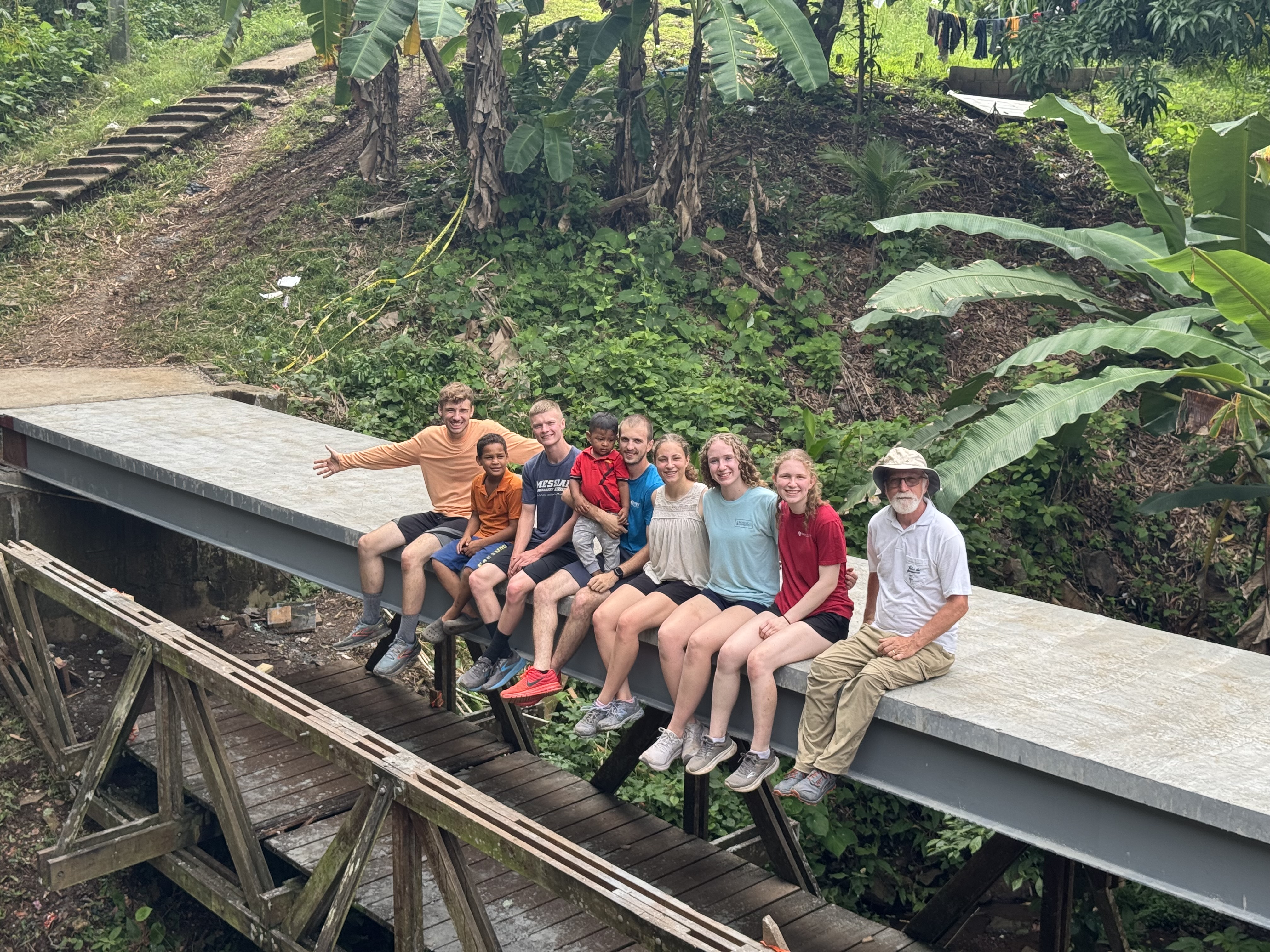 Panama Bridge Team sitting on completed bridge 2025