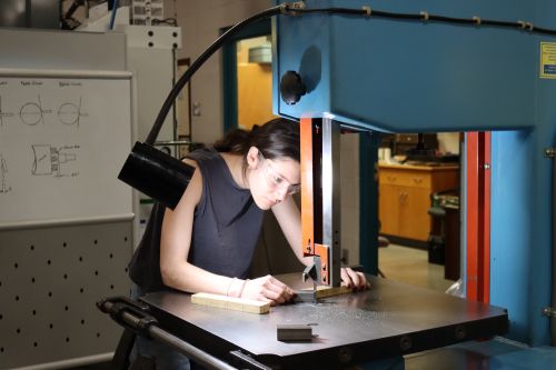 A student working on the BUV Crimp project