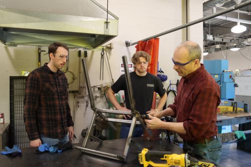 Students working on the Sikalongo wheelchair project