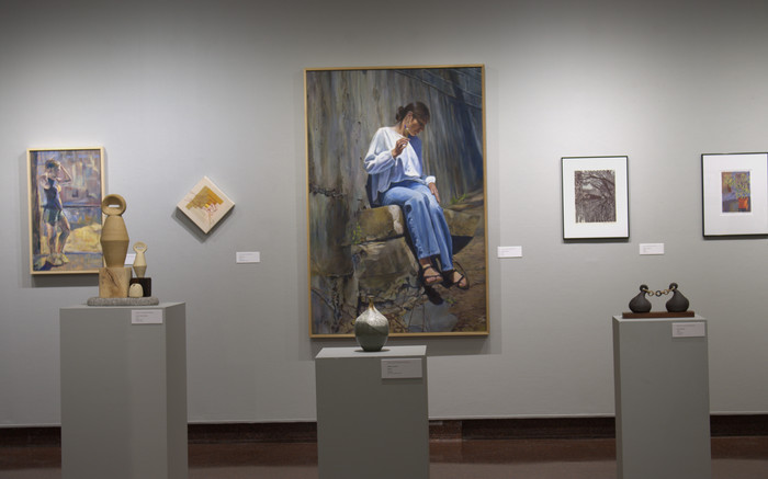 gallery with large paintings and sculptures