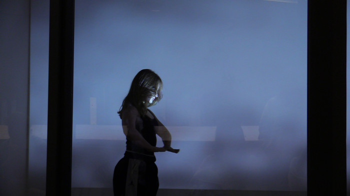 Woman in blue room