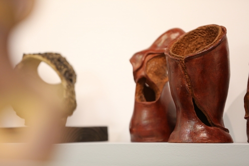 A clay form in the glass gallery.