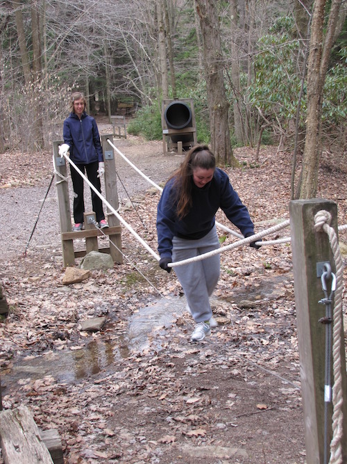 Students testing out exercise equipment.