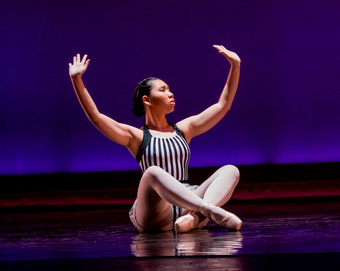 A student performing in Culmination. 