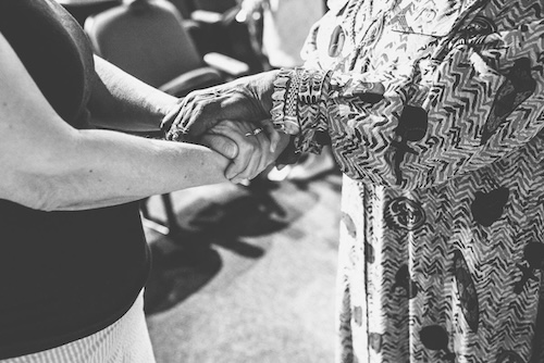 Reflection - holding hands - Grace