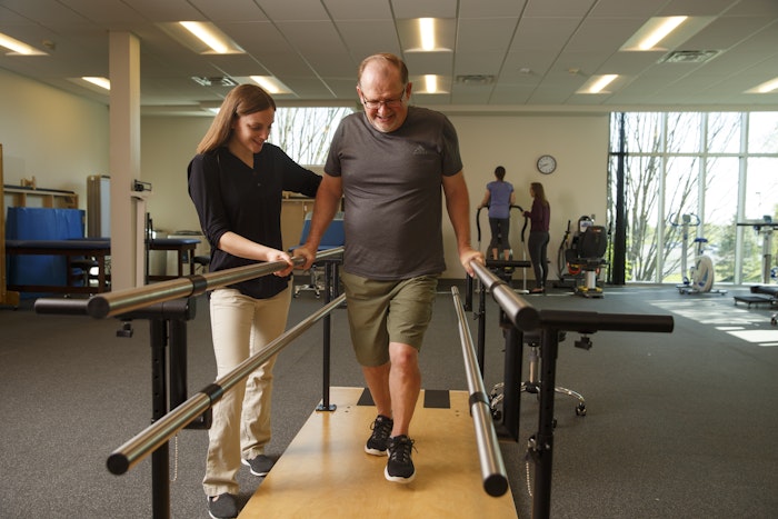 A grad student with a PT client 