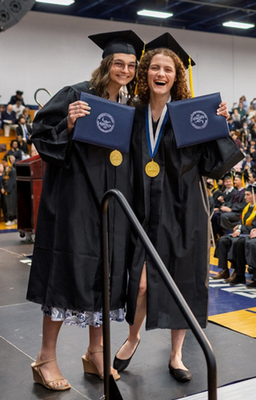 honor student receiving plaque