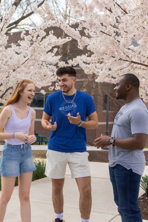 A group of Messiah students laughing together