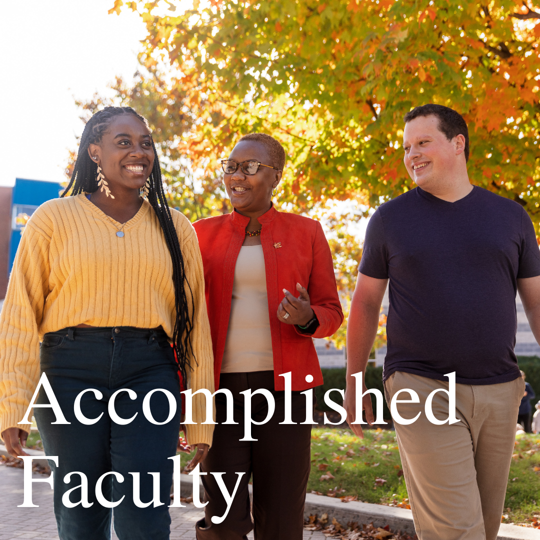 two students and a professor in the social work department