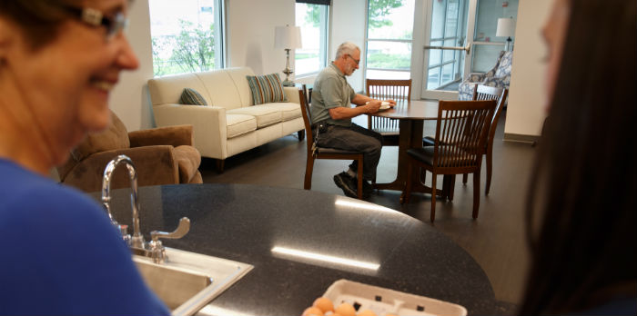 Patients work with an occupational therapist in the daily living apartment at winding hill.