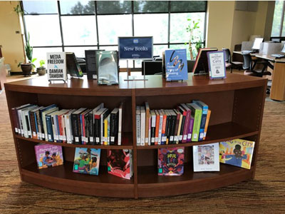 Friends purchased the bookshelf at the main entrance of Murray Library.  The bookshelf houses the new books and recreational reading collection.