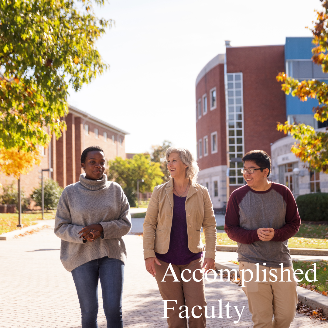 Accomplished Faculty photo with 2 students walking
