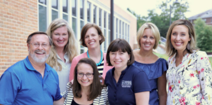 Staff from the Career Center at Messiah College in a group photo smiling.