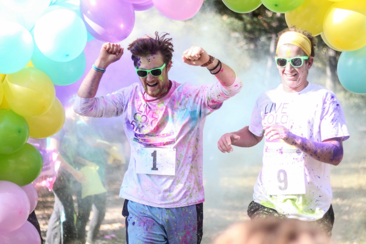 Students running in the Homecoming Color Run