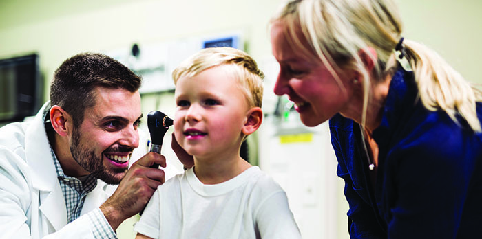 Individuals from Messiah's DNP program examine a patient