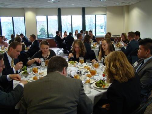 Members of Delta Mu Delta having a luncheon.