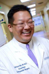 Dr. Michael Suk, MD, JD, MPH, MBA