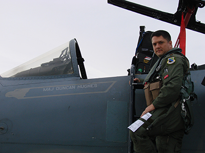 Duncan Hughes preparing to board a jet.