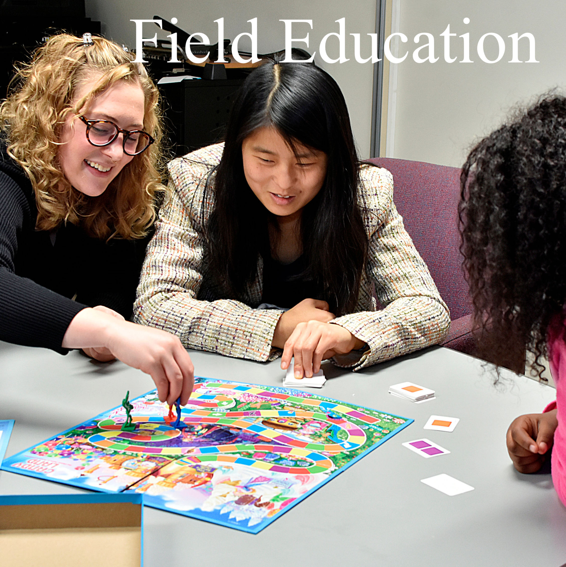social work students playing a game with a student