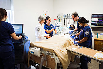 Nursing students in sim lab