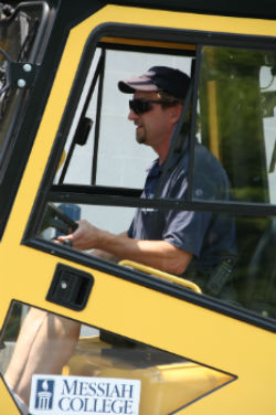 Employee in tractor