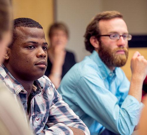 Students paying attention in class. 