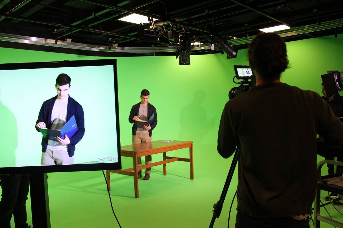 Students producing videos at the Film and Media Production Studio at Hostetter Chapel.