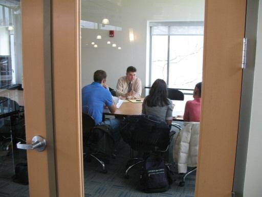 Group of students having a meeting at Larsen.