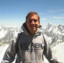 Jordan Parenti in front of mountains on IBI