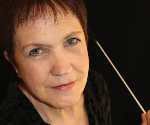 Linda Tedford holding a conducting baton.