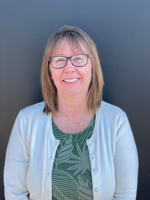 Picture of Lorraine in front of a black wall