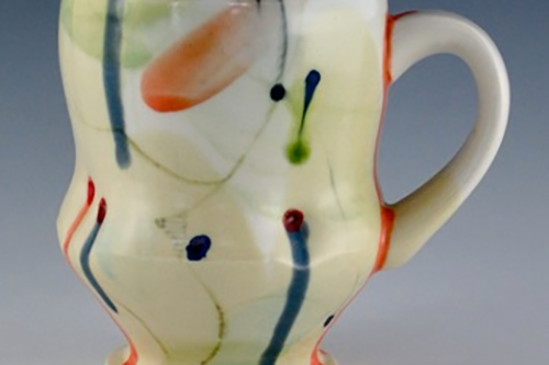 A mug sculpted by Lydia Johnson.