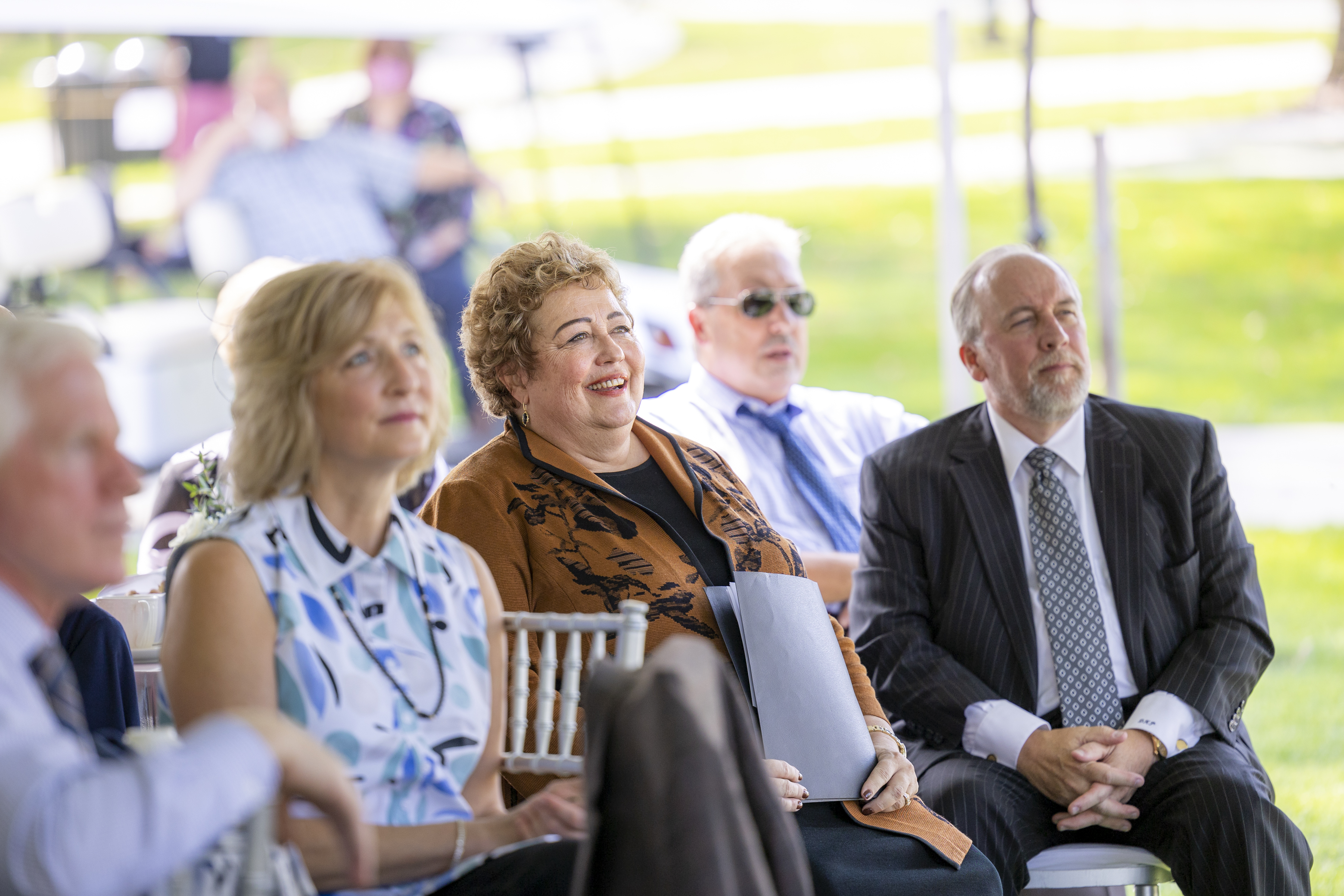 President Phipps sitting at the dedication ceremony for the AWC