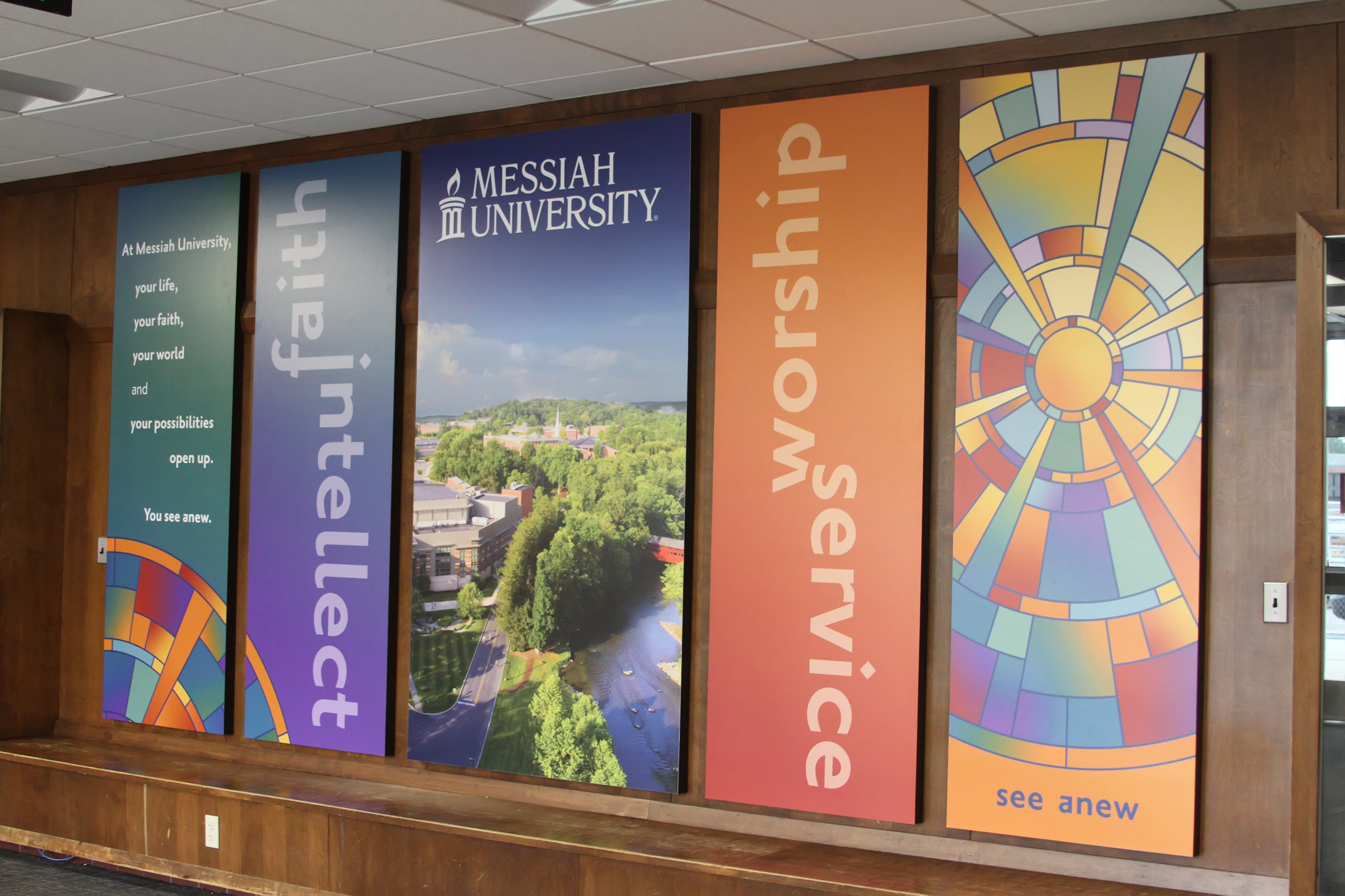 Ligature and stained glass banners in Eisenhower Campus Center
