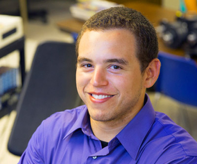 Nathaniel Jenkins smiling toward the camera.