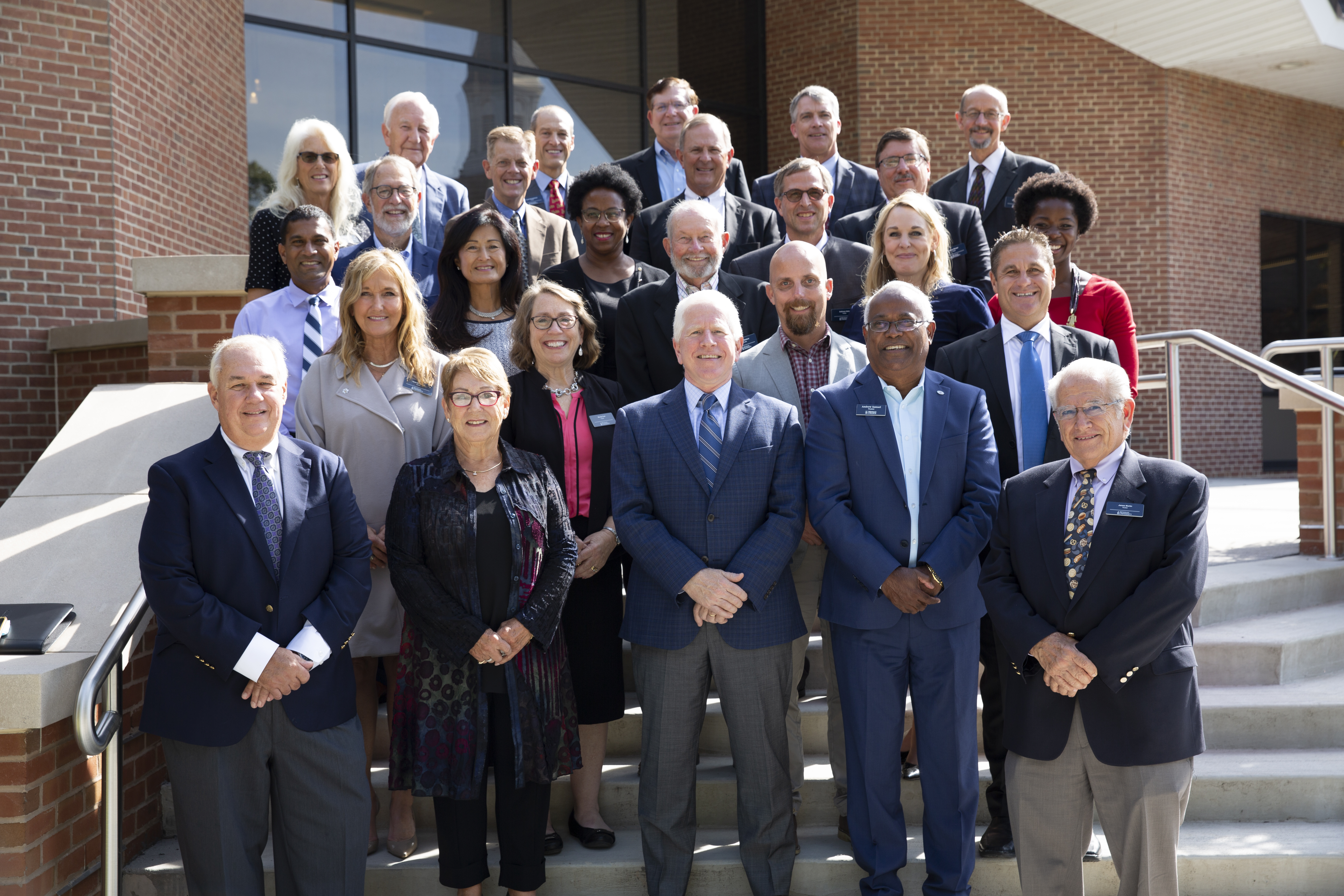 photo of the Messiah University Board of Trustees standing outside of Murray Library in October 2021