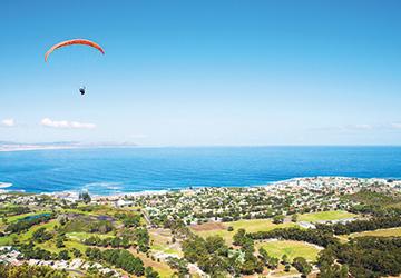 parachuting above a city in South Africa