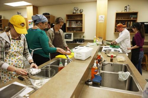 Students cooking at the Food Lab at Jordan basement.