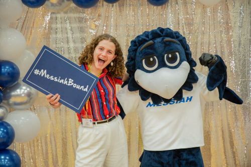 Admitted student celebrating at ASPD photo booth