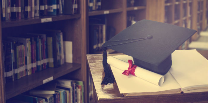Graduation hat on top of a book