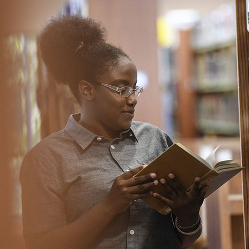 Student in library